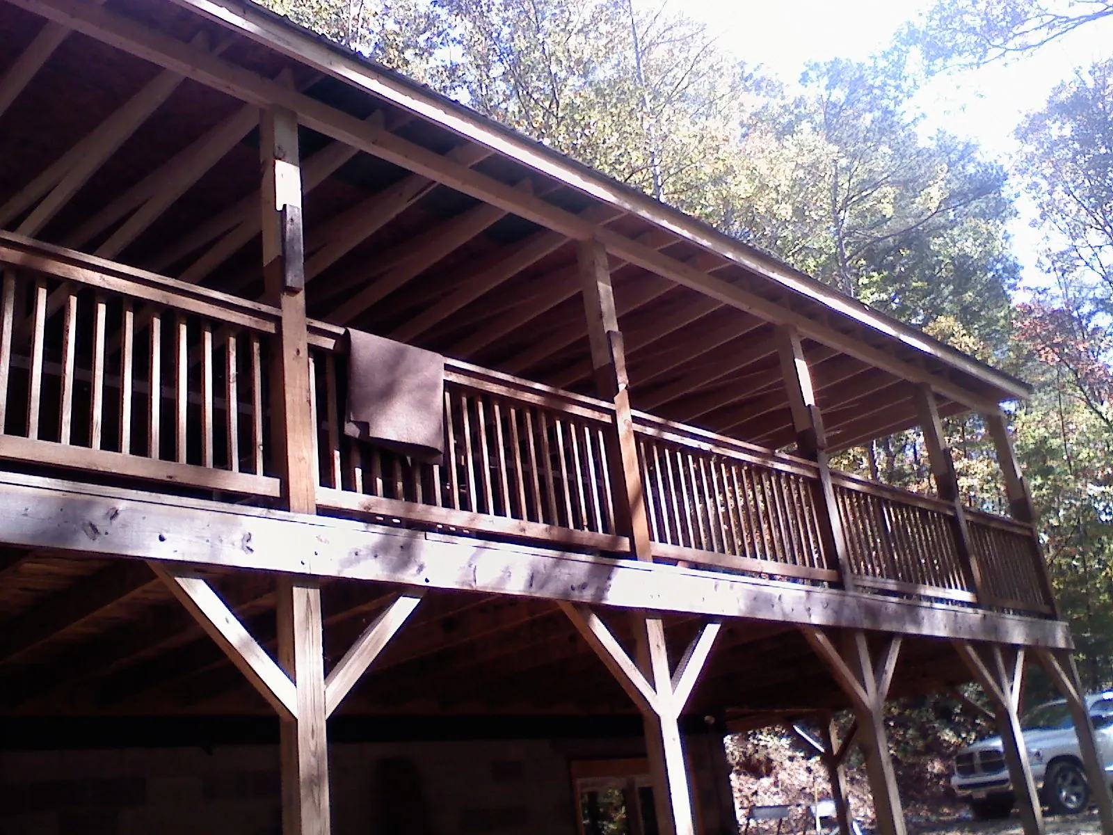 Timber framing under a new elevated porch and deck — Roof Leak Repair in Interlochen by Roofing Brothers